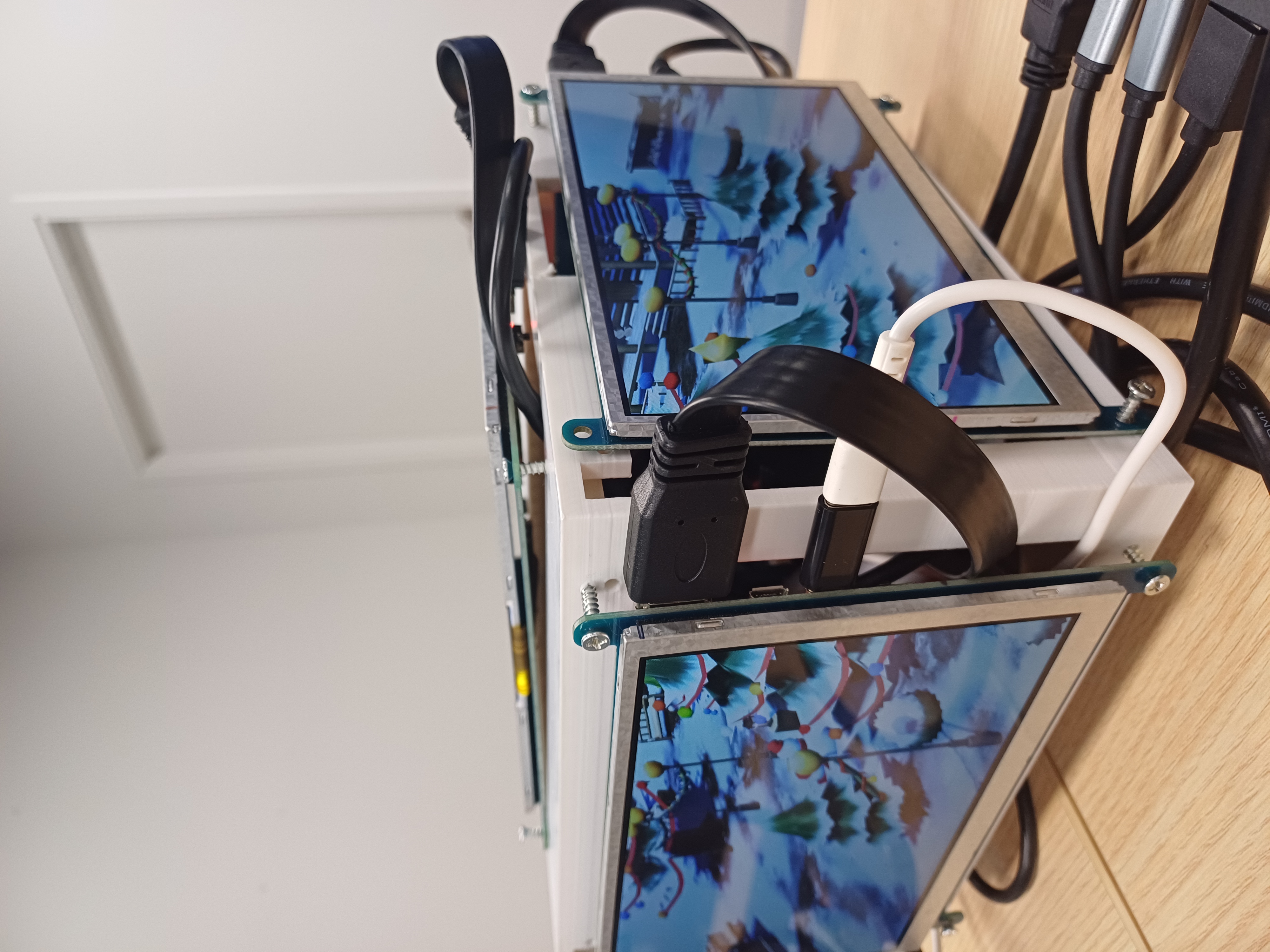 Physical Parallax Display Cube hardware and rendered result.